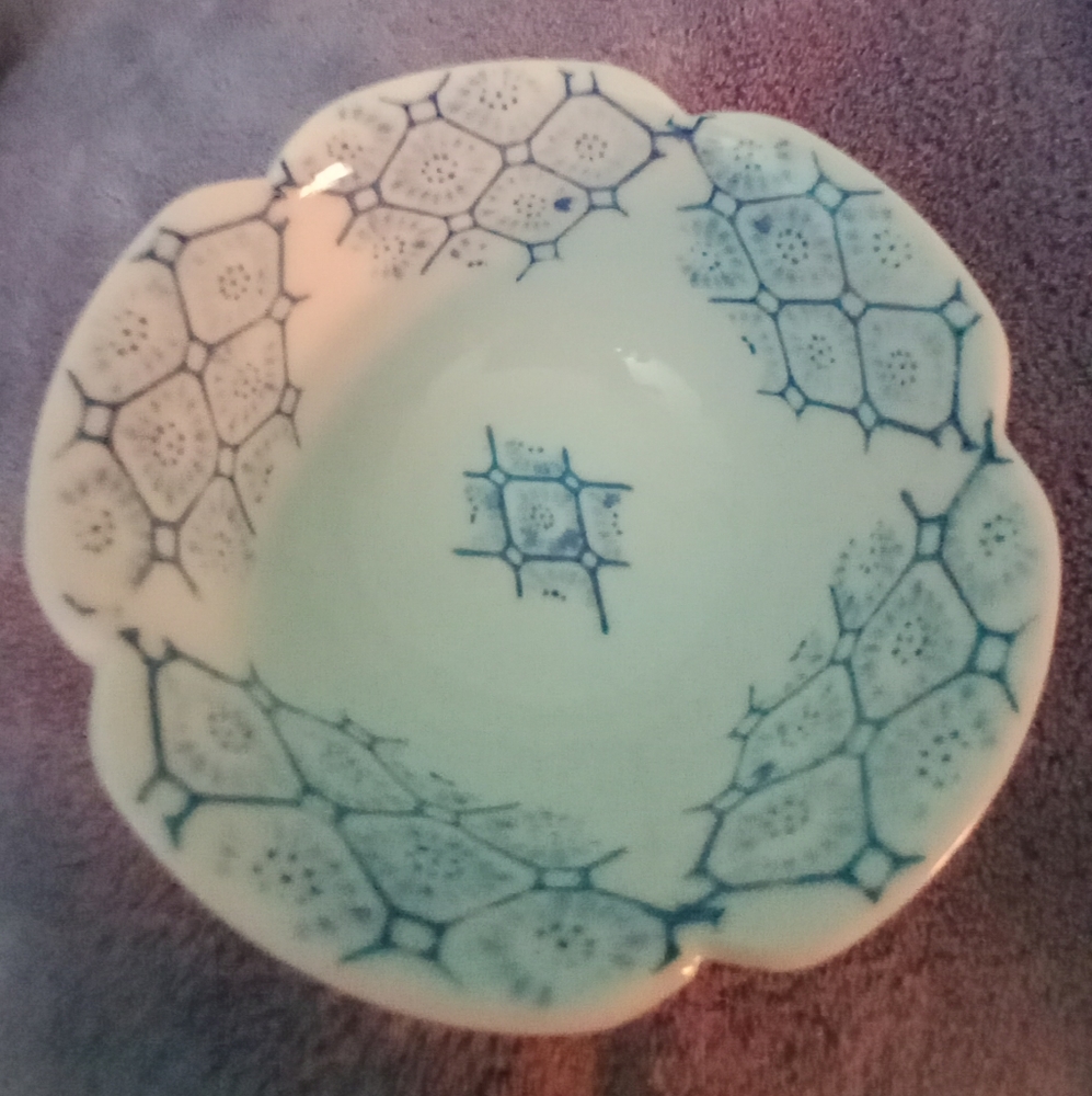 Porcelain dish, off white and blue. Made in Japan.